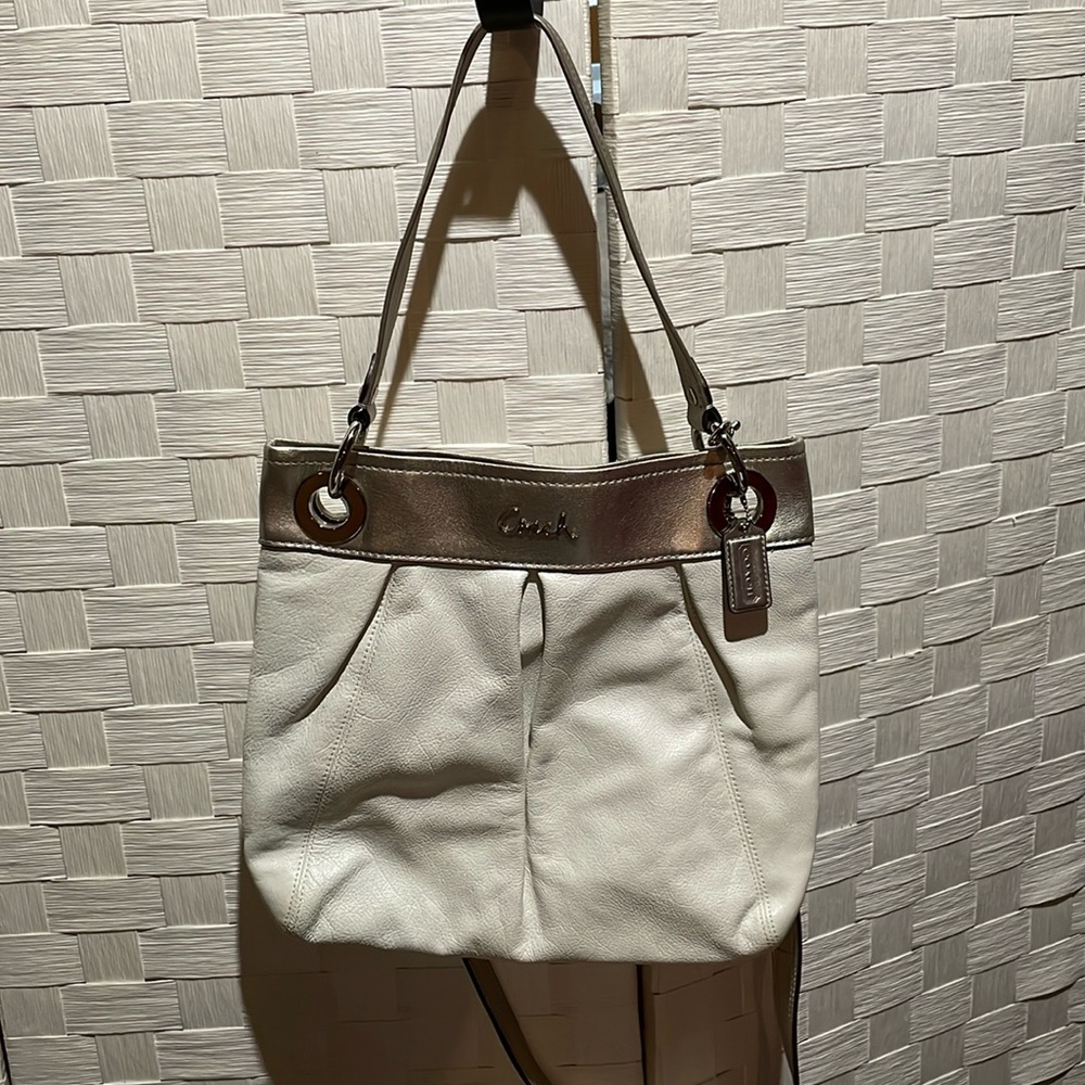 Coach cream and gold handbag brand new never used. Excellent condition.